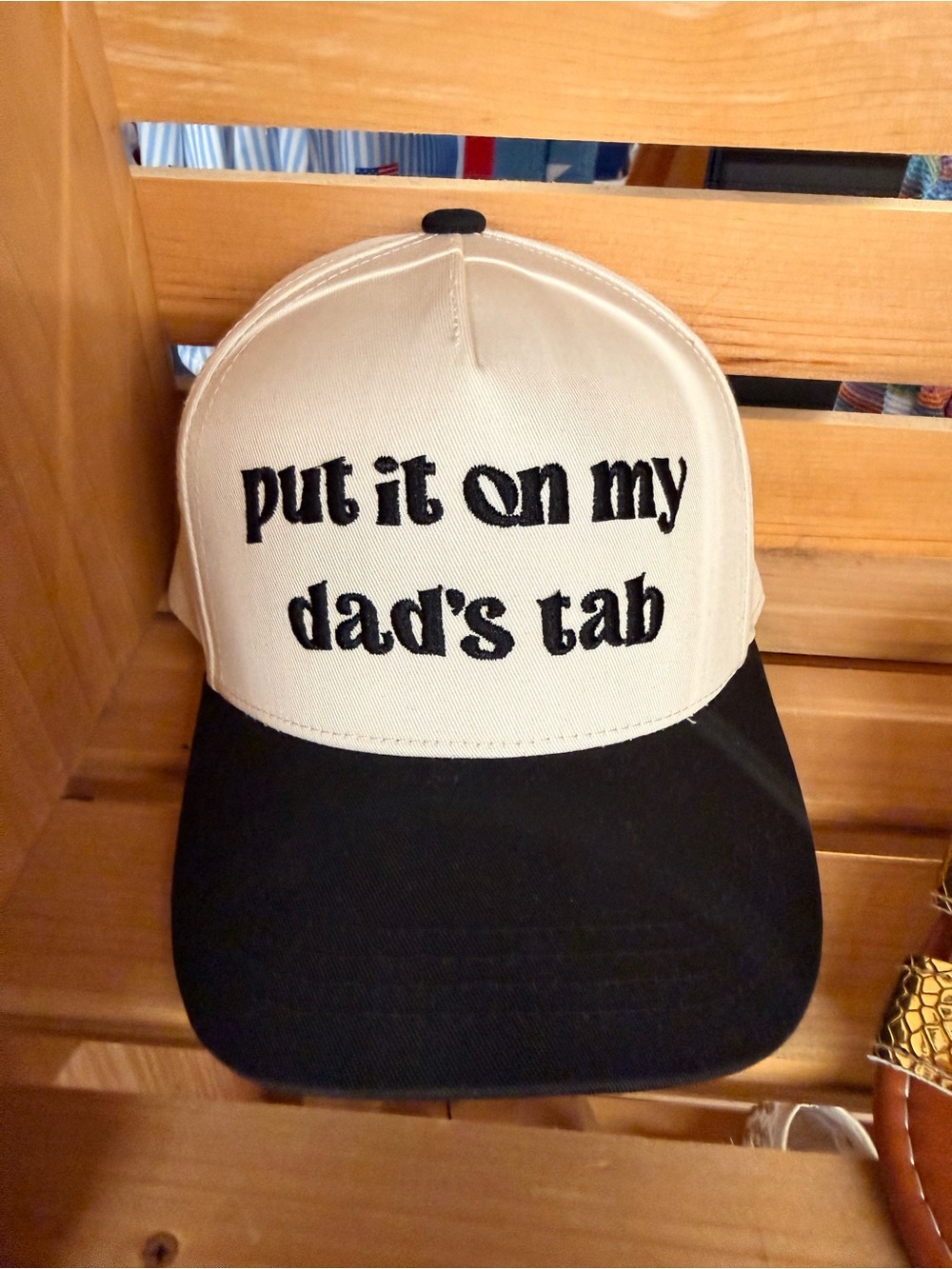 Beige and Black Trucker Hat - "put it on my dad's tab"